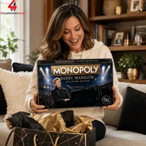 Woman holding Barry Manilow Monopoly collector edition board game