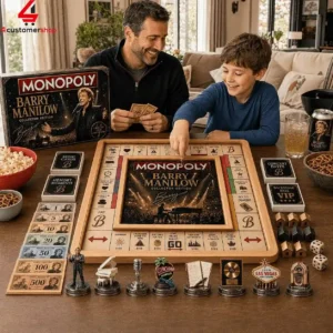 Father and son playing a Barry Manilow collector edition Monopoly board game.