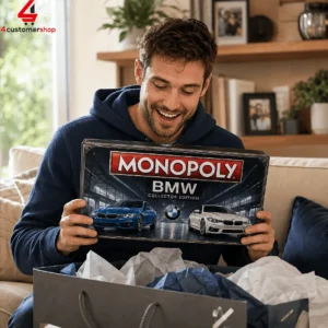 Man holding a BMW Collector Edition Monopoly board game box