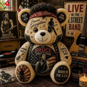 Custom Bruce Springsteen themed plush teddy bear decorated with iconic song titles and musical memorabilia.