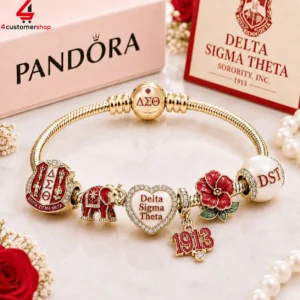 Gold Pandora bracelet featuring Delta Sigma Theta sorority charms