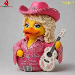 Collectable Dolly Parton themed rubber duck figurine holding a guitar
