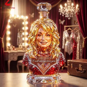 Crystal bust of Dolly Parton in a red sequined dress with commemorative dates.