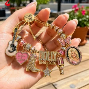Dolly Parton memorial charm bracelet with guitar, microphone, and portrait charms