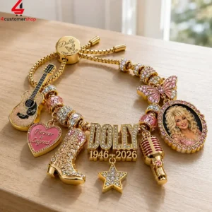 Gold charm bracelet honoring Dolly Parton with country music symbols.