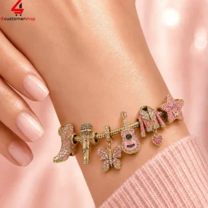 Dolly Parton-themed charm bracelet on a wrist