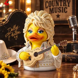 A yellow rubber duck designed as Dolly Parton holding a guitar, wearing a rhinestone-embellished white outfit.