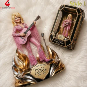 Collectible Dolly Parton memorial figure with acoustic guitar and decorative display box
