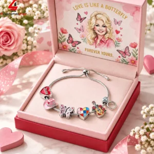 Dolly Parton themed charm bracelet in a pink gift box