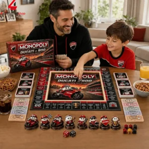 Father and son playing the Monopoly Ducati x Boo Collector Edition board game at home.