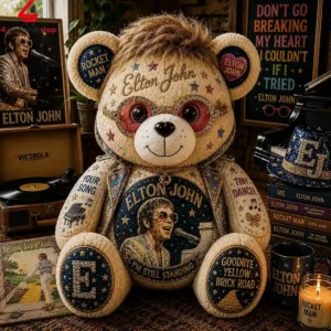 Elton John tribute plush bear featuring song titles and iconic imagery