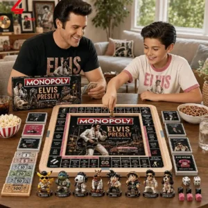 Father and son playing Elvis Presley themed Monopoly board game.