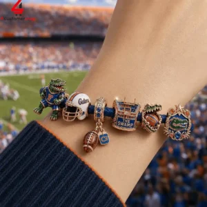 University of Florida Gators charm bracelet on a fan's wrist at a football stadium.
