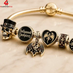 Gold charm bracelet featuring Hollywood Vampires themed jewelry