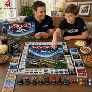 Father and son playing NASCAR Monopoly board game at home