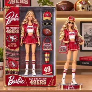 San Francisco 49ers themed Barbie doll in packaging and standing outside next to accessories