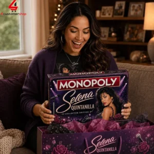 Woman excitedly opening a Selena Quintanilla Collector Edition Monopoly board game.