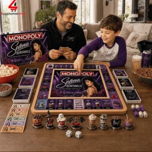 Father and son playing the Selena Quintanilla Collector Edition Monopoly board game at home.