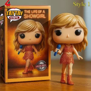Collectable vinyl figure of a female pop singer in a sparkly orange outfit