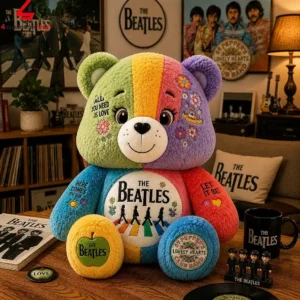 A multicolored plush bear themed after The Beatles featuring iconic imagery.