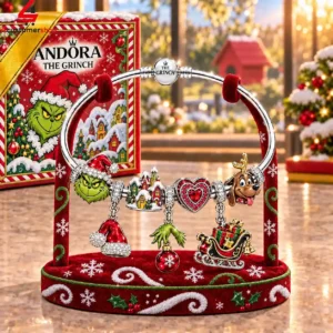 Pandora The Grinch collectible charm bracelet on a red velvet display stand