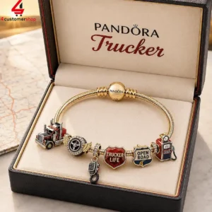 Pandora gold snake chain bracelet featuring custom trucker-themed charms.